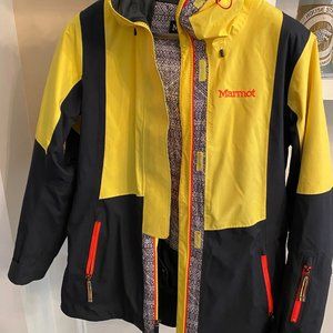 Marmot yellow / black women's ski jacket, many zip pockets adjustable hood Med.